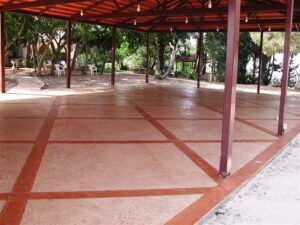 Outdoor covered space with patterned flooring