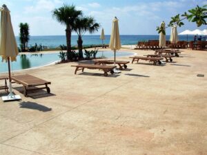 Empty sun loungers by the ocean
