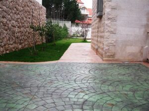 Green and beige pathway near garden
