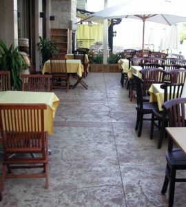Outdoor café with yellow tablecloths