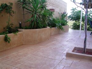 Garden terrace with potted plants.