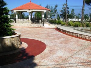 Elegant stone pathway leading to gazebo.