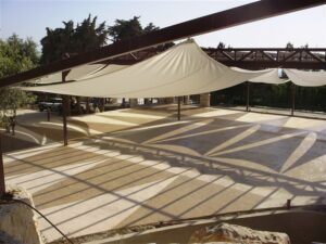 Open-air space with fabric canopy