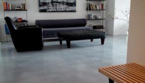 Minimalist lounge area with bookshelf