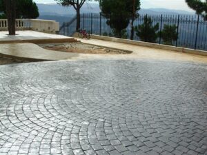 Bicycle near cobblestone surface and railing