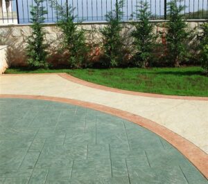 Curved walkway with grass and trees