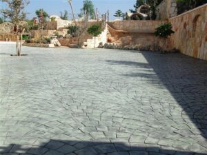 Stone courtyard with patterned paving