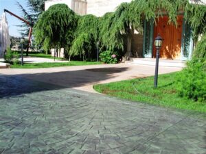 Brick-patterned pathway with greenery
