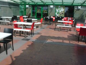 Red and black chairs in patio setting