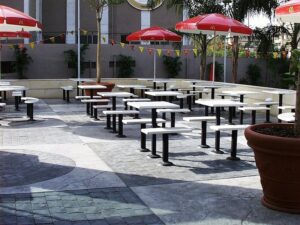 Outdoor seating area with red umbrellas