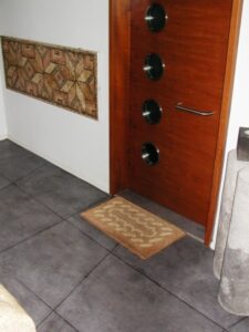 Tiled hallway with decorative wall art