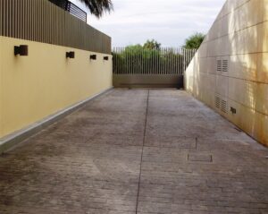 Secluded passageway leading to greenery