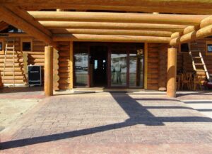 Log cabin entrance with wooden beams