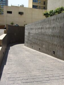 Urban alley with high walls