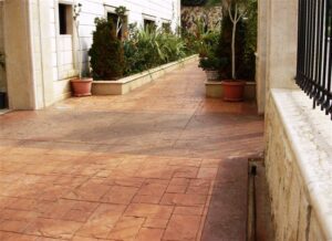 Brick pathway with potted plants