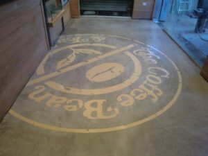 Circular logo design on smooth flooring