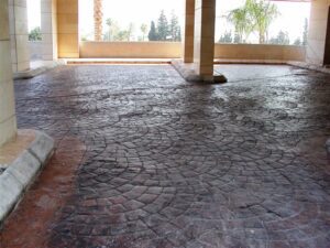 Curved stone driveway with pillars