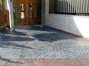 Decorative stone driveway with shadows