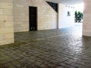 Open courtyard with dark wooden door