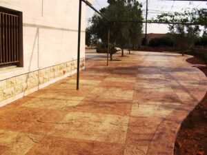 Spacious outdoor tiled area by building