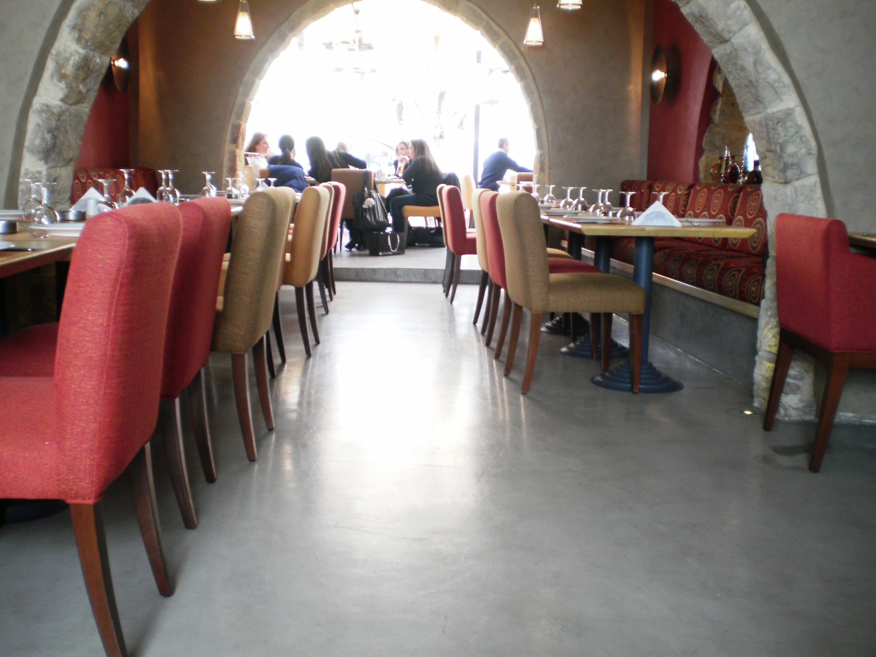 Cozy dining area with arched entrance