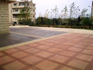 Tiled outdoor area with trees and buildings