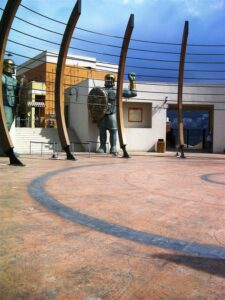 Outdoor area with sculptures and arches
