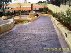 Paved pathway leading to outdoor structure