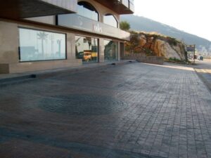 Building entrance with brick pavement
