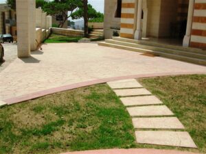 Lawn and walkway near house entrance