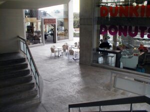 Empty chairs outside a cafe