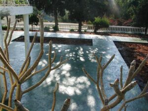 Sunlight casting shadows on a patio