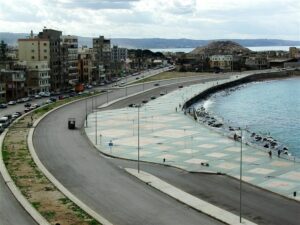 Coastal promenade with urban backdrop