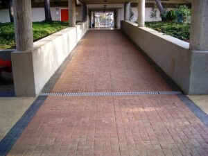 Brick pathway under covered walkway