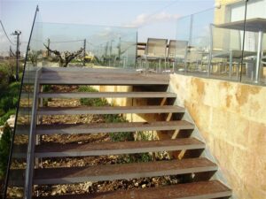 Outdoor staircase with glass railings