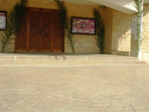 Building entrance with palm decorations