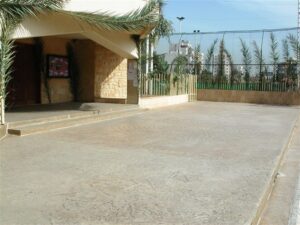 Building entrance with concrete courtyard