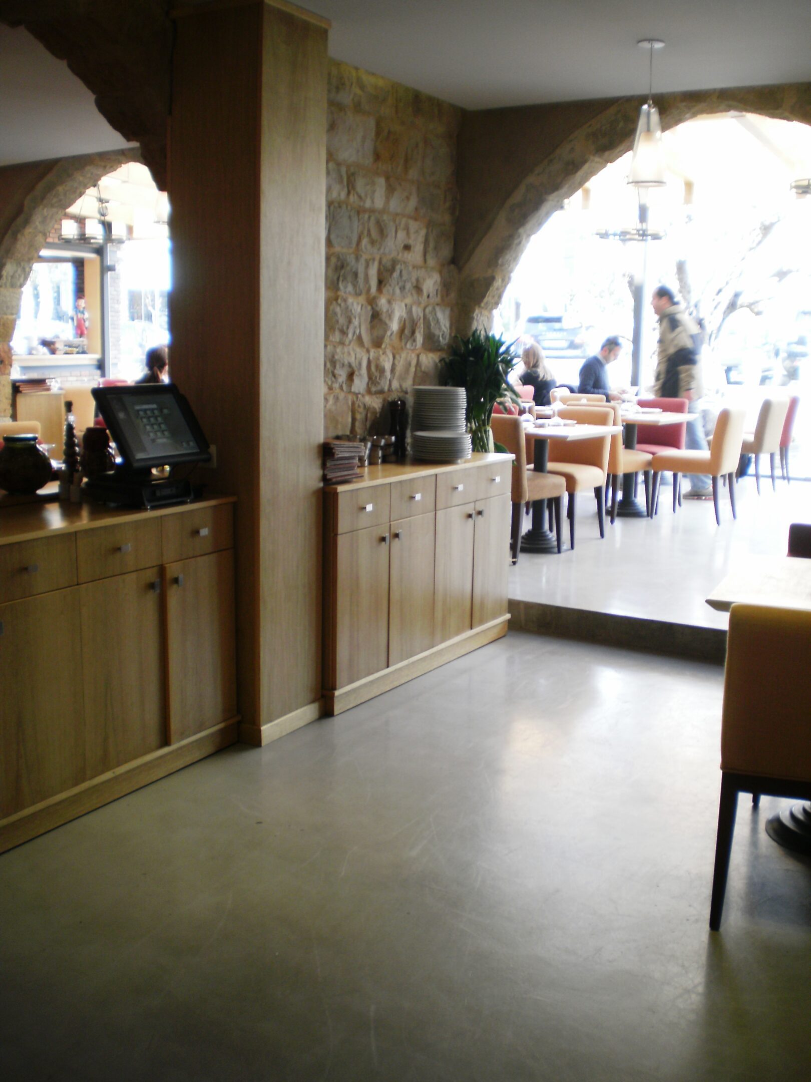 Cozy restaurant interior with wooden cabinets
