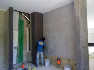 Man working on wall renovation