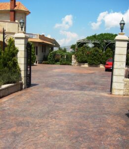 Driveway entrance with stone pillars