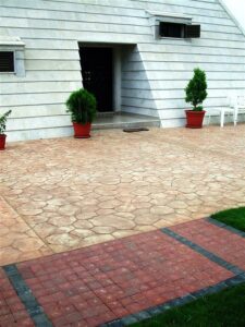 Red-brick path and concrete entrance steps