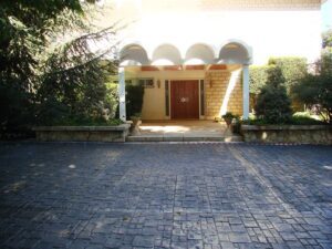 House entrance with arched canopy