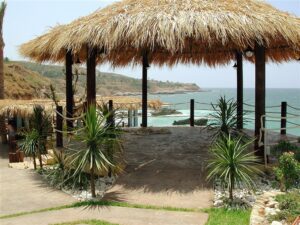 Scenic coastal gazebo overlooking the sea.