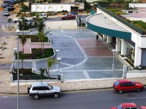 Empty paved area near road
