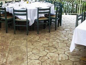 Outdoor dining setup with white tablecloths