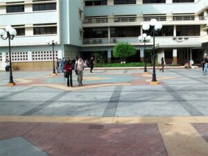 University campus courtyard with students walking