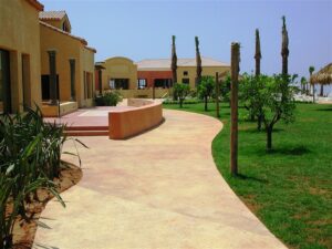 Curved walkway in a sunny courtyard