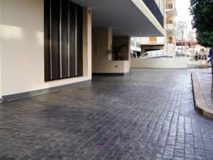 Covered walkway beside building entrance