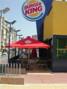 Burger King patio with red umbrella