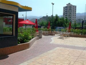 Outdoor café with tables and umbrellas